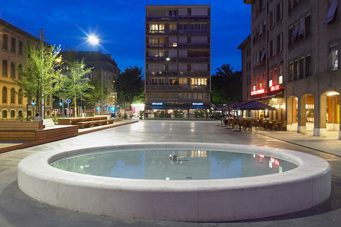 Piazza piacevolmente illuminata a Ginevra, Svizzera, con le soluzioni di illuminazione urbana di Philips 